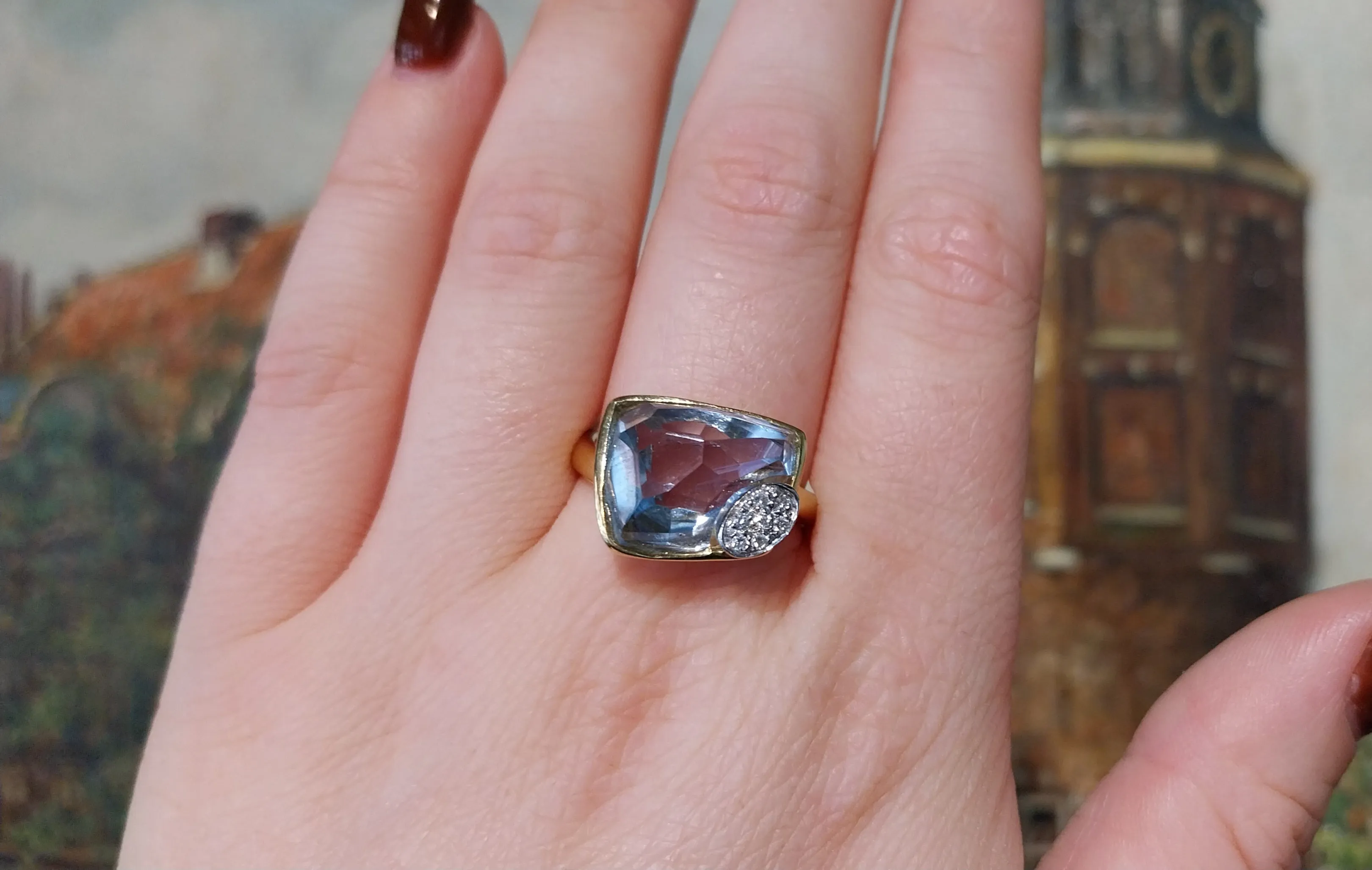 Aquamarine and diamond ring in 18 carat gold