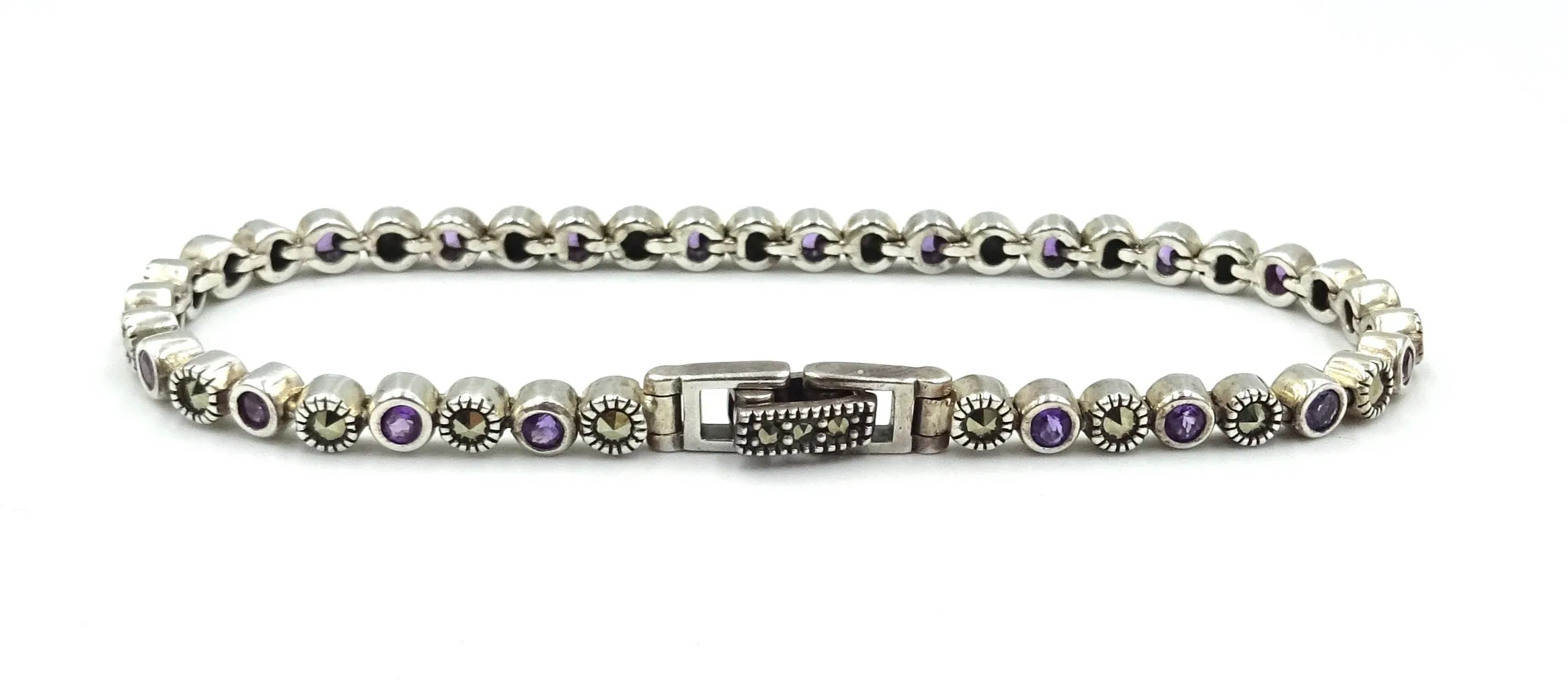 Ladies silver, marcasite and amethyst bracelet. 12.6gr