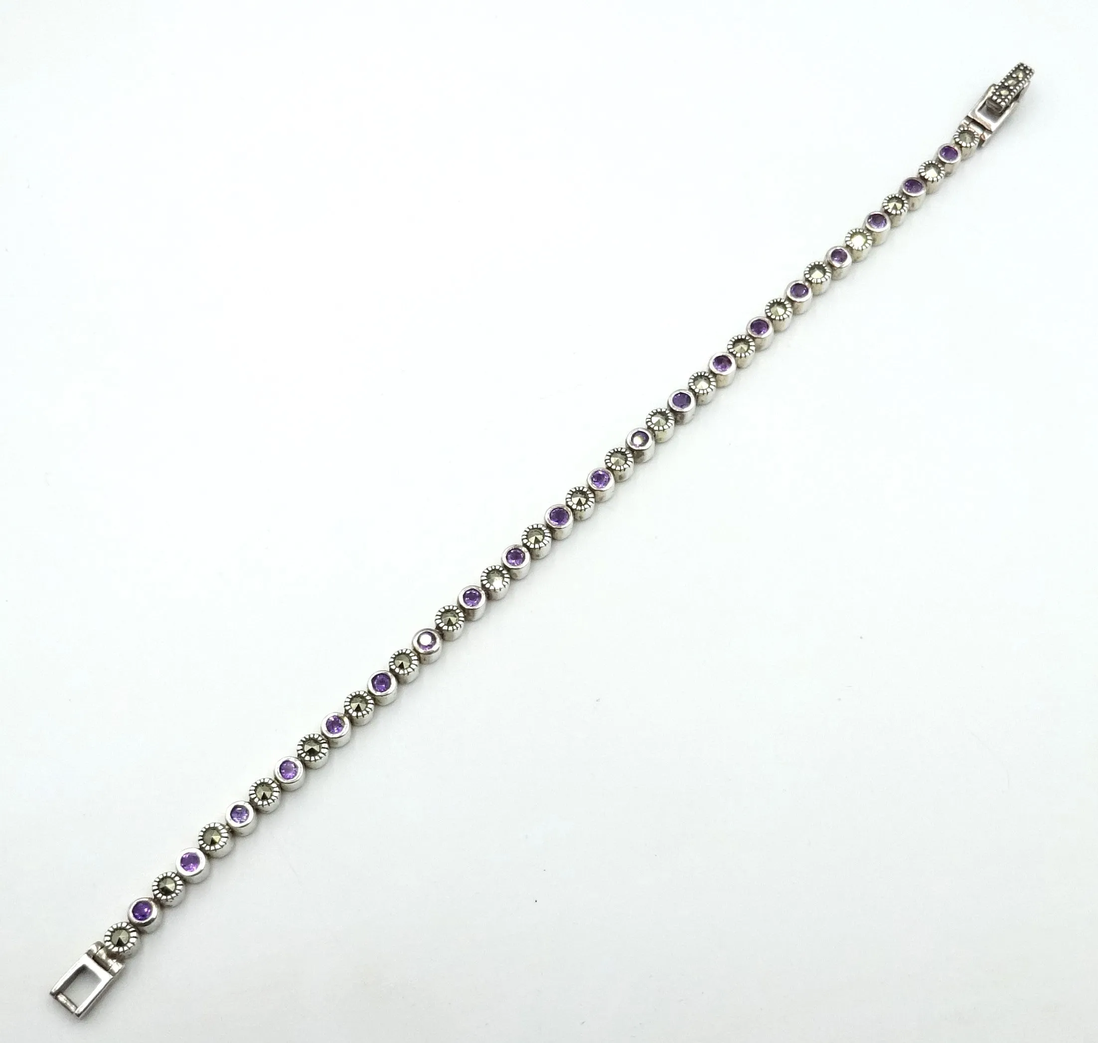 Ladies silver, marcasite and amethyst bracelet. 12.6gr