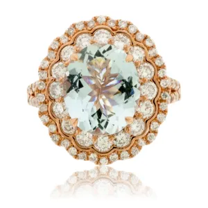 Oval Aquamarine and Scalloped Double Halo Diamond Ring