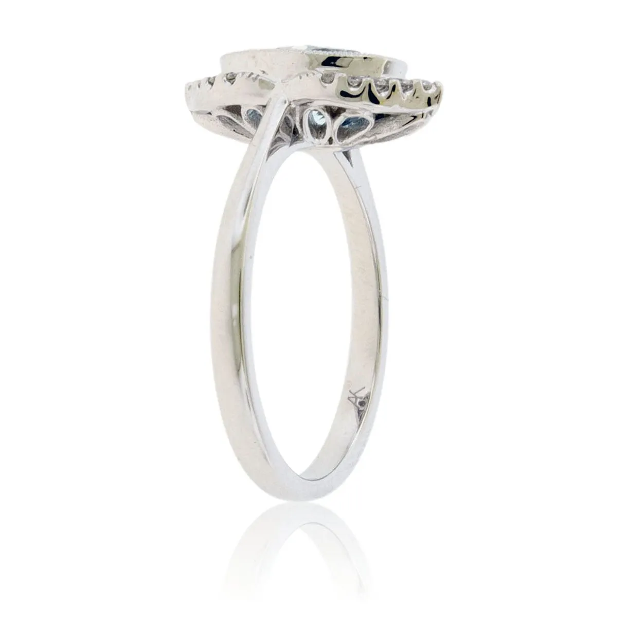 Oval-Cut Aquamarine with Unique Diamond Halo Ring