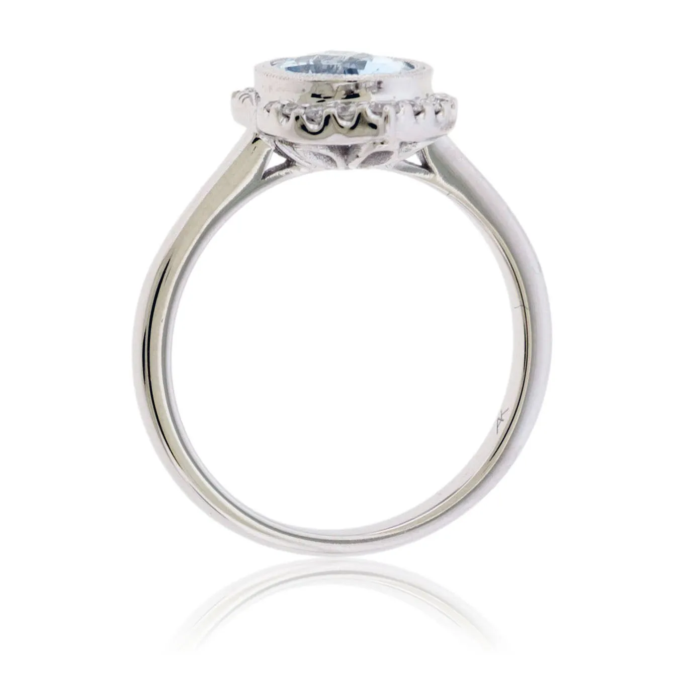Oval-Cut Aquamarine with Unique Diamond Halo Ring