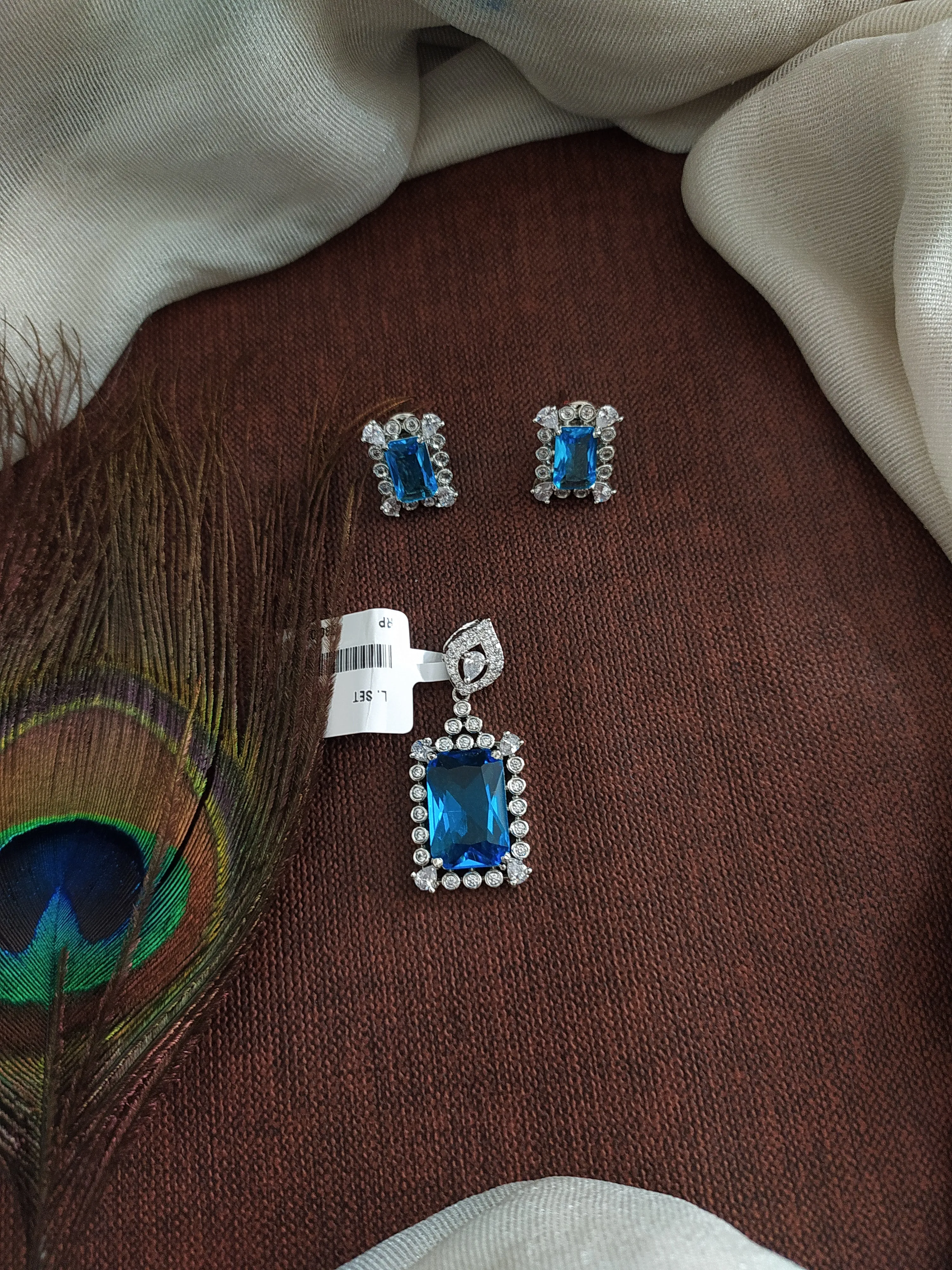 Rhodium Plated Pendant Set with Aqua Blue and Zircon Stones