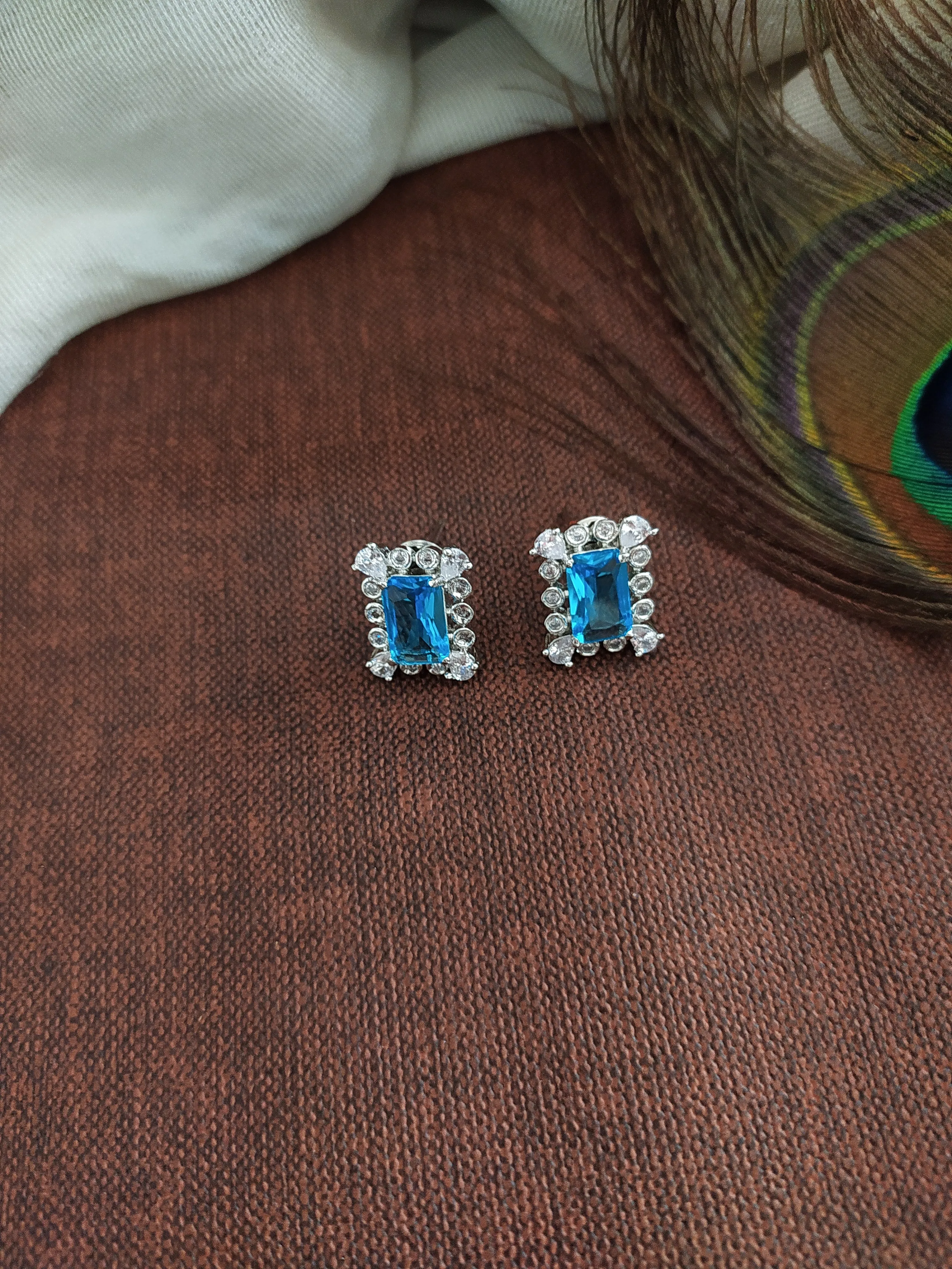 Rhodium Plated Pendant Set with Aqua Blue and Zircon Stones